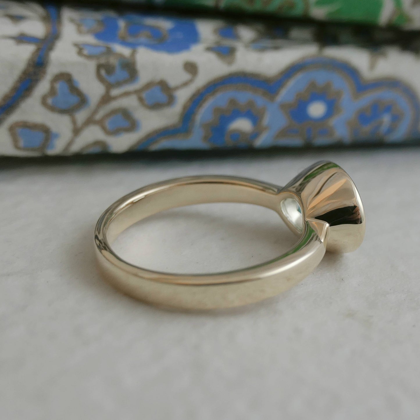 8x10mm Oval Blue Topaz Gold Plated Sterling Silver Ring