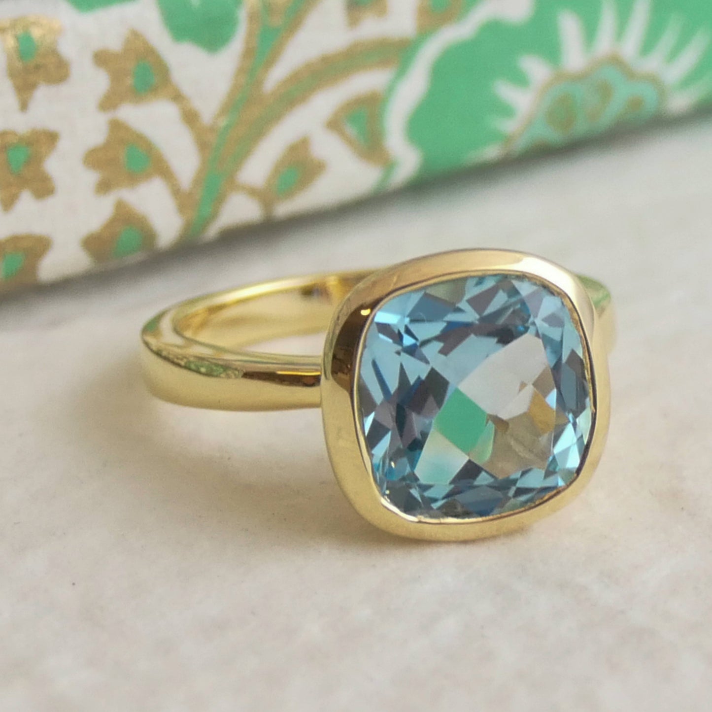 10mm Cushion Cut Blue Topaz Gold Plated Sterling Silver Ring