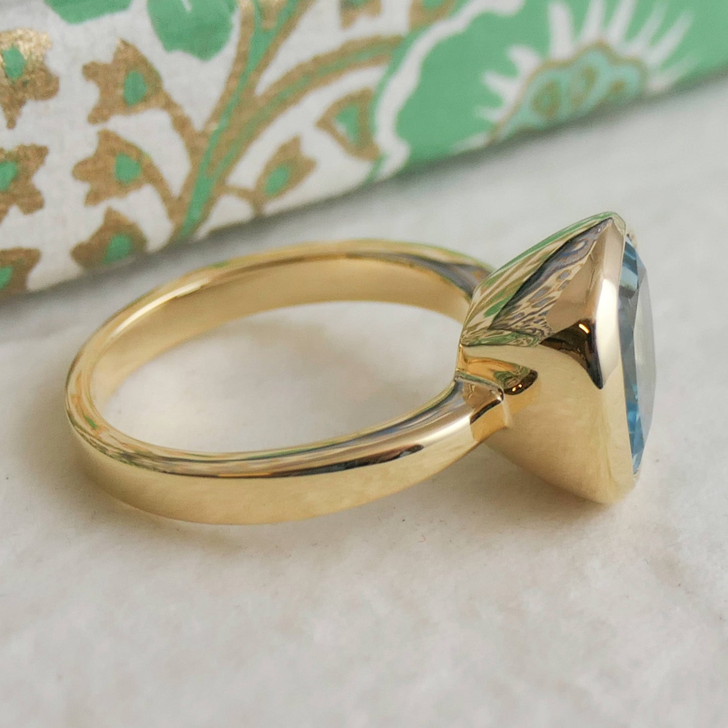 10mm Cushion Cut Blue Topaz Gold Plated Sterling Silver Ring