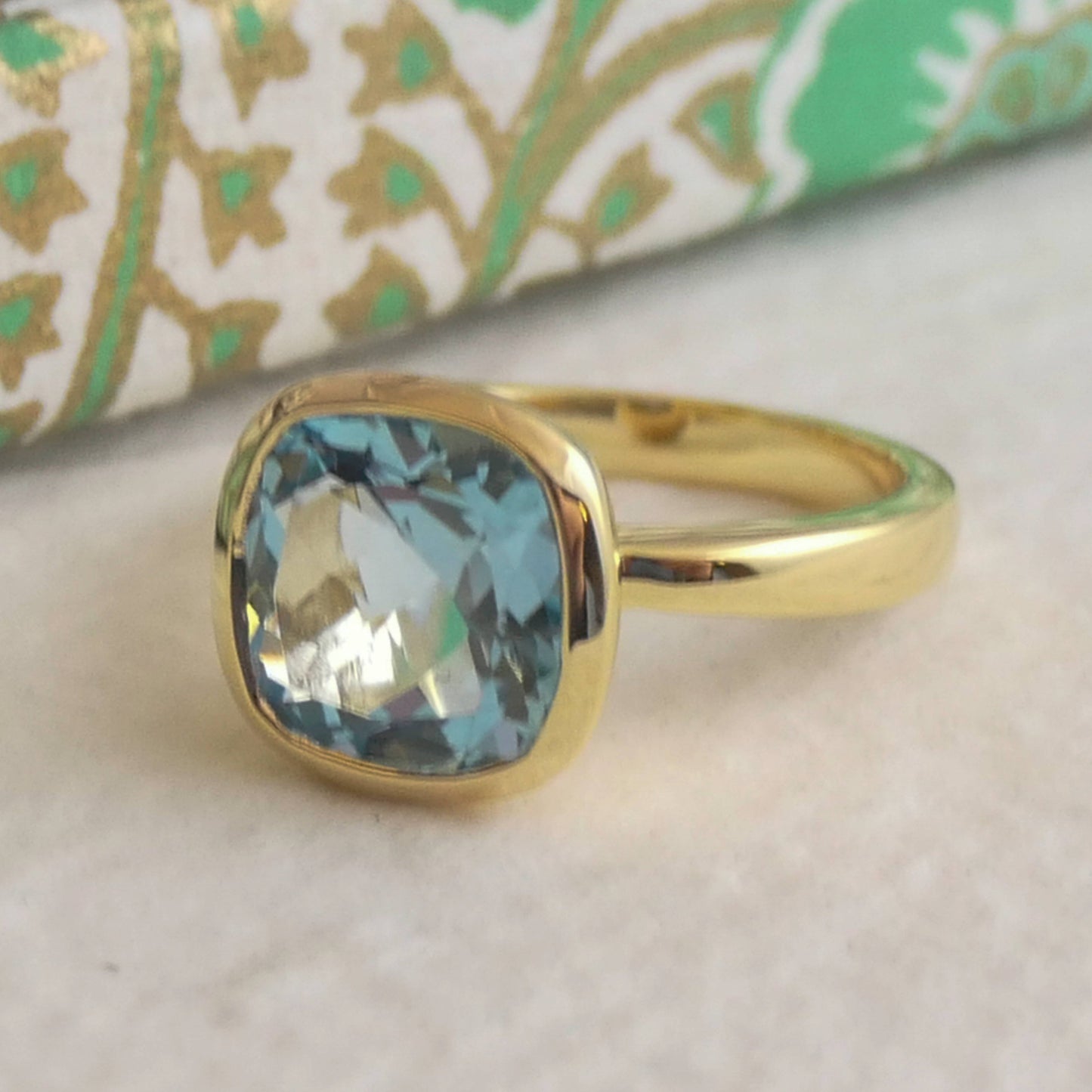 10mm Cushion Cut Blue Topaz Gold Plated Sterling Silver Ring