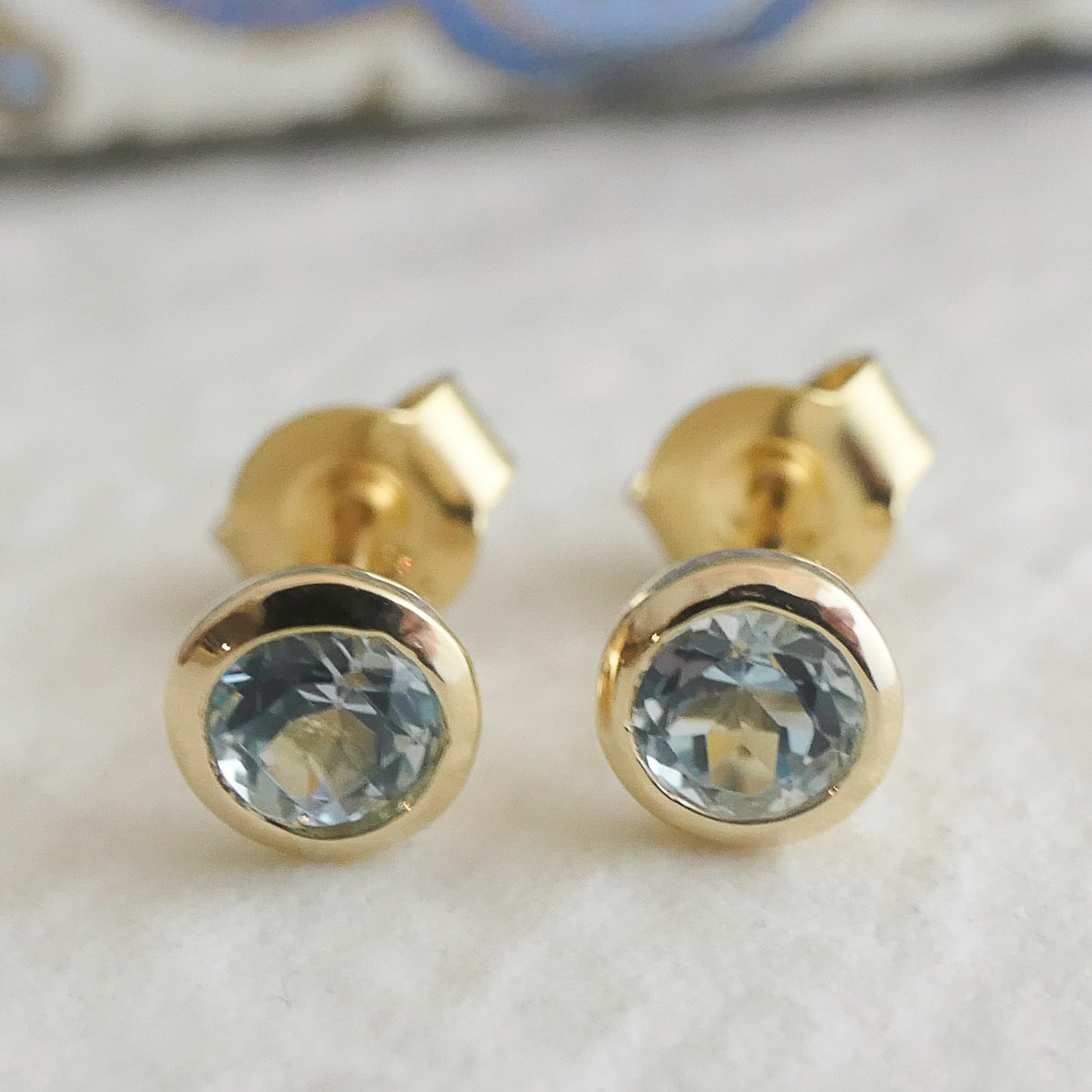 4mm Blue Topaz Gold Plated Sterling Silver Stud Earrings