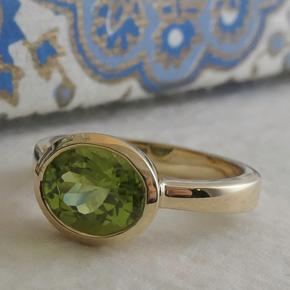 7.7x9.2mm Oval cut Peridot 14kt Gold Ring Size 7